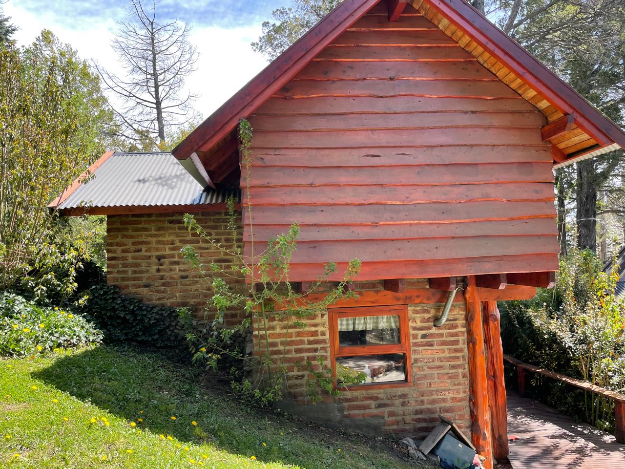 Wood, brick and climbing plants